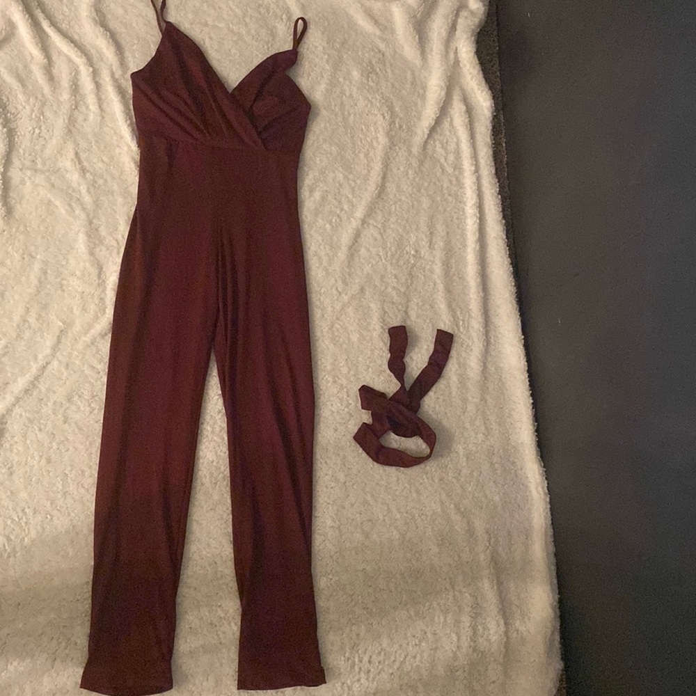 Never worn wine colored one piece